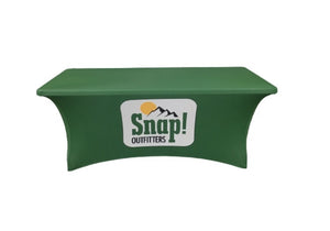 4', 5', 6', and 8' Custom Stretch Table Covers with Logo. Our custom stretch table covers are made of four-way stretch, 240 gsm commercial grade spandex poly fabric, which is 100% wrinkle free. Print your business logo on stretch tablecloths in either a 3 sided or a 4 sided option for 4 ft, 5 ft, 6 ft, and 8 ft tables. These spandex elastic table covers are printed, cut, and sewn exactly to your table dimensions and are designed for the perfect fit on your event tables.